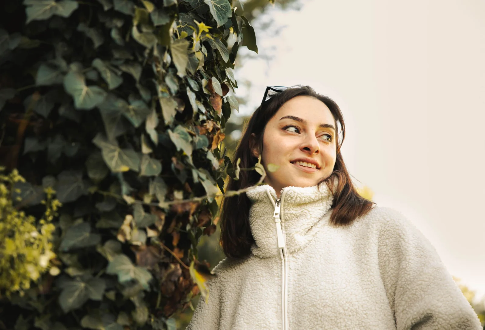 The girl-next-door aesthetic: natural smile, no styling, outdoor light